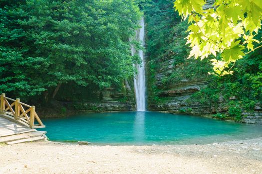 Beautiful view of Tatlica Waterfalls surrounded by lush greenery in summer, Sinop Province, Turkey.
