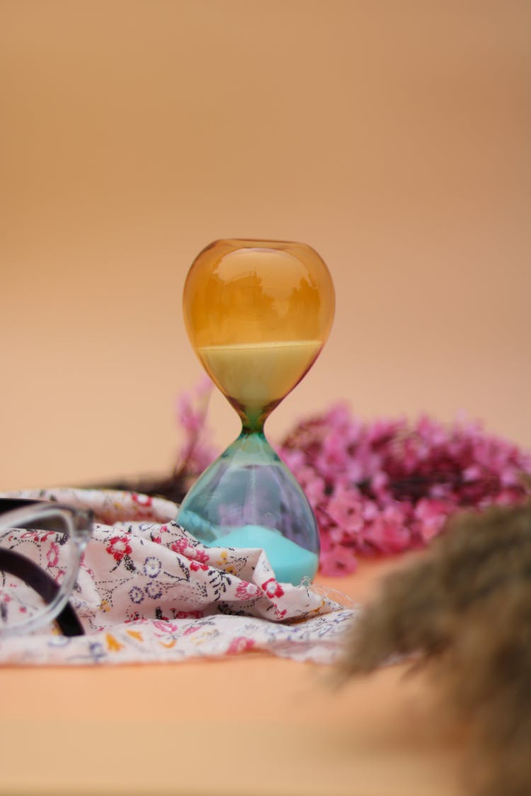 Hourglass On Floral Cloth