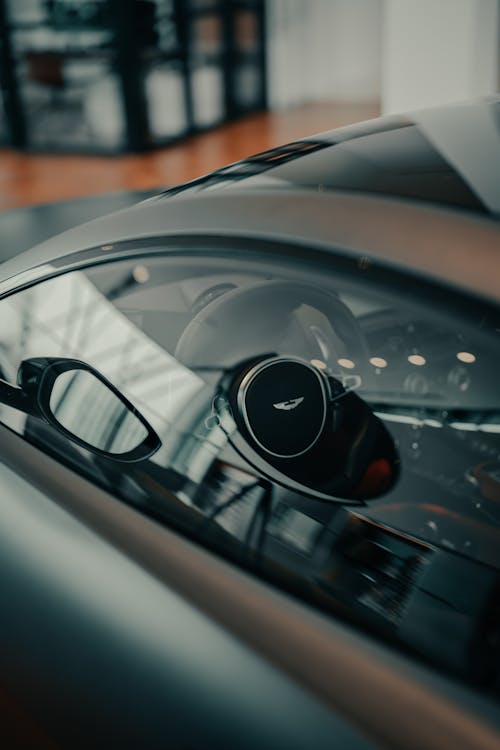 Steering Wheel of Aston Martin Car through Window