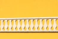 Railing on Yellow Wall