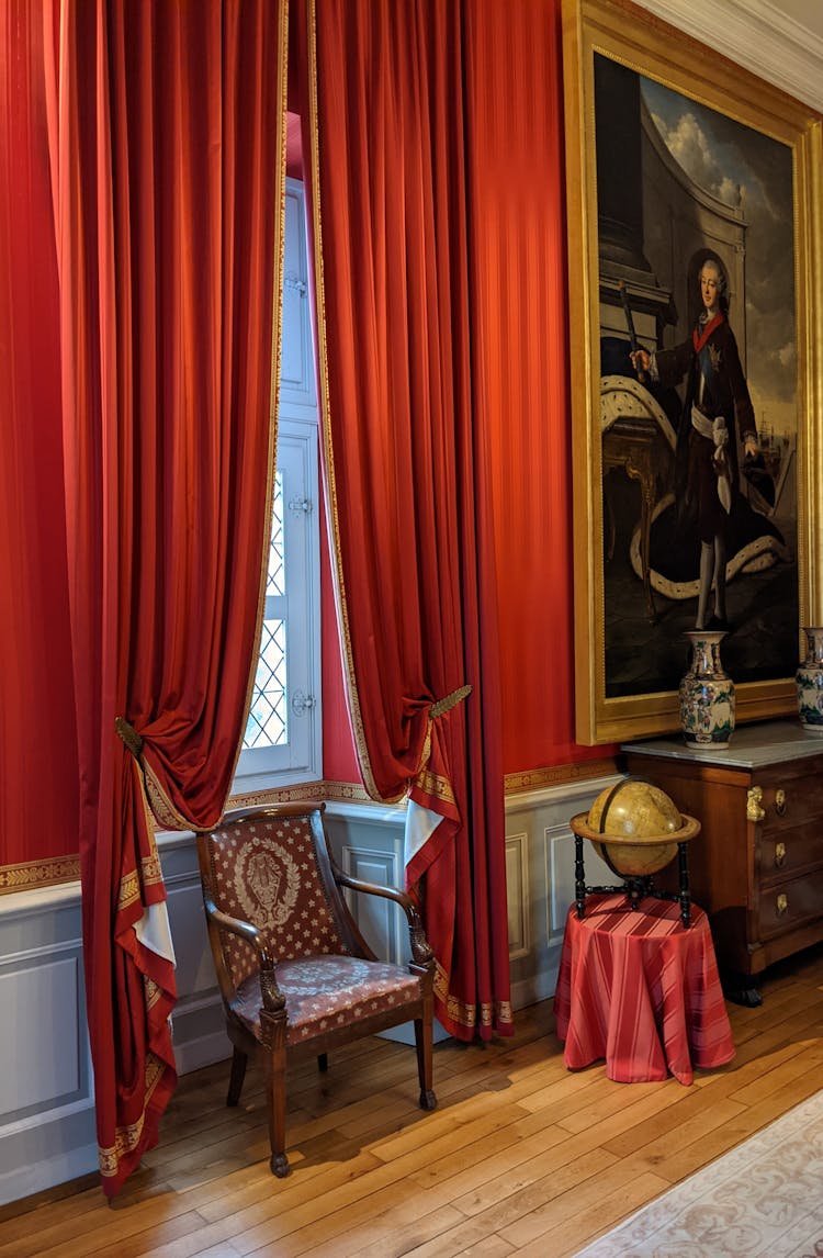 Red Curtains Near Painting In Museum