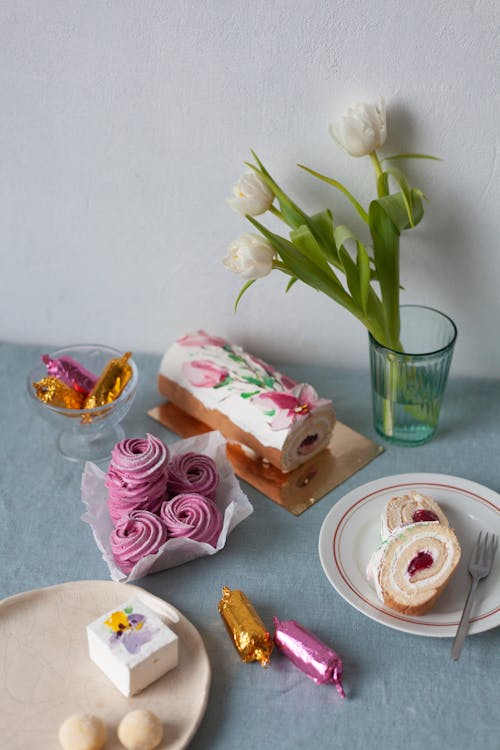 Still Life with Pastel Cakes and White Tulips