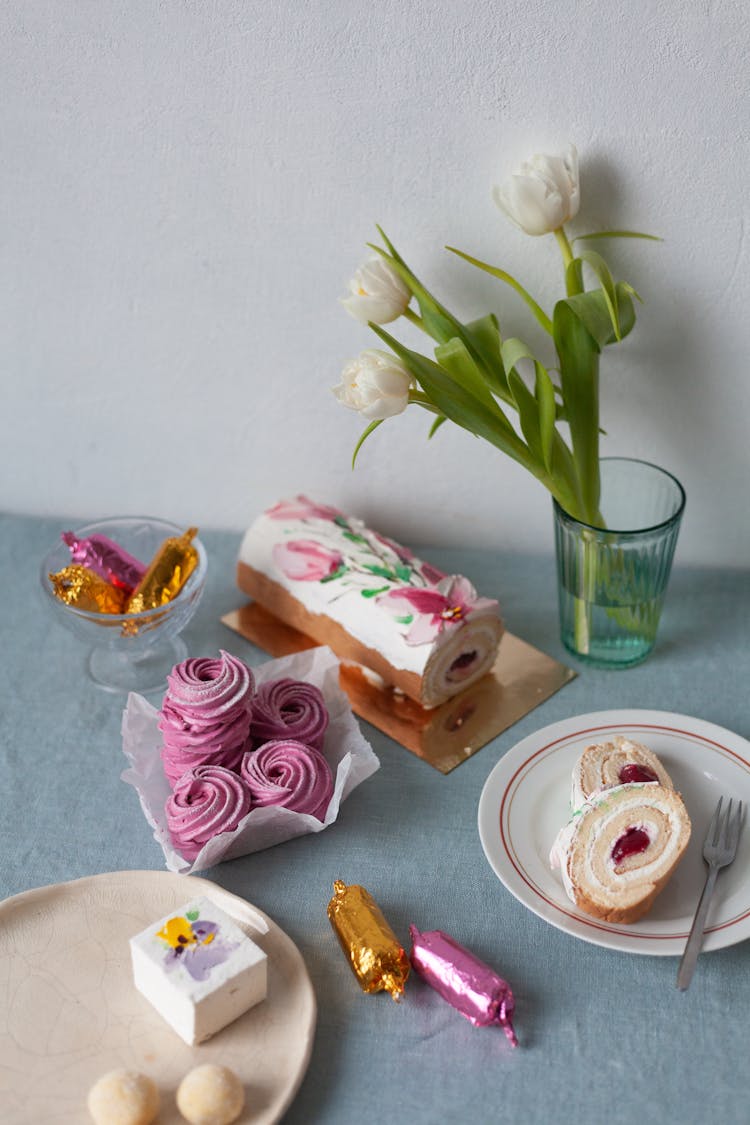 Still Life With Pastel Cakes And White Tulips