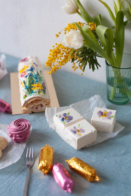 Decorative Easter Sweets and a Bouquet on a Table