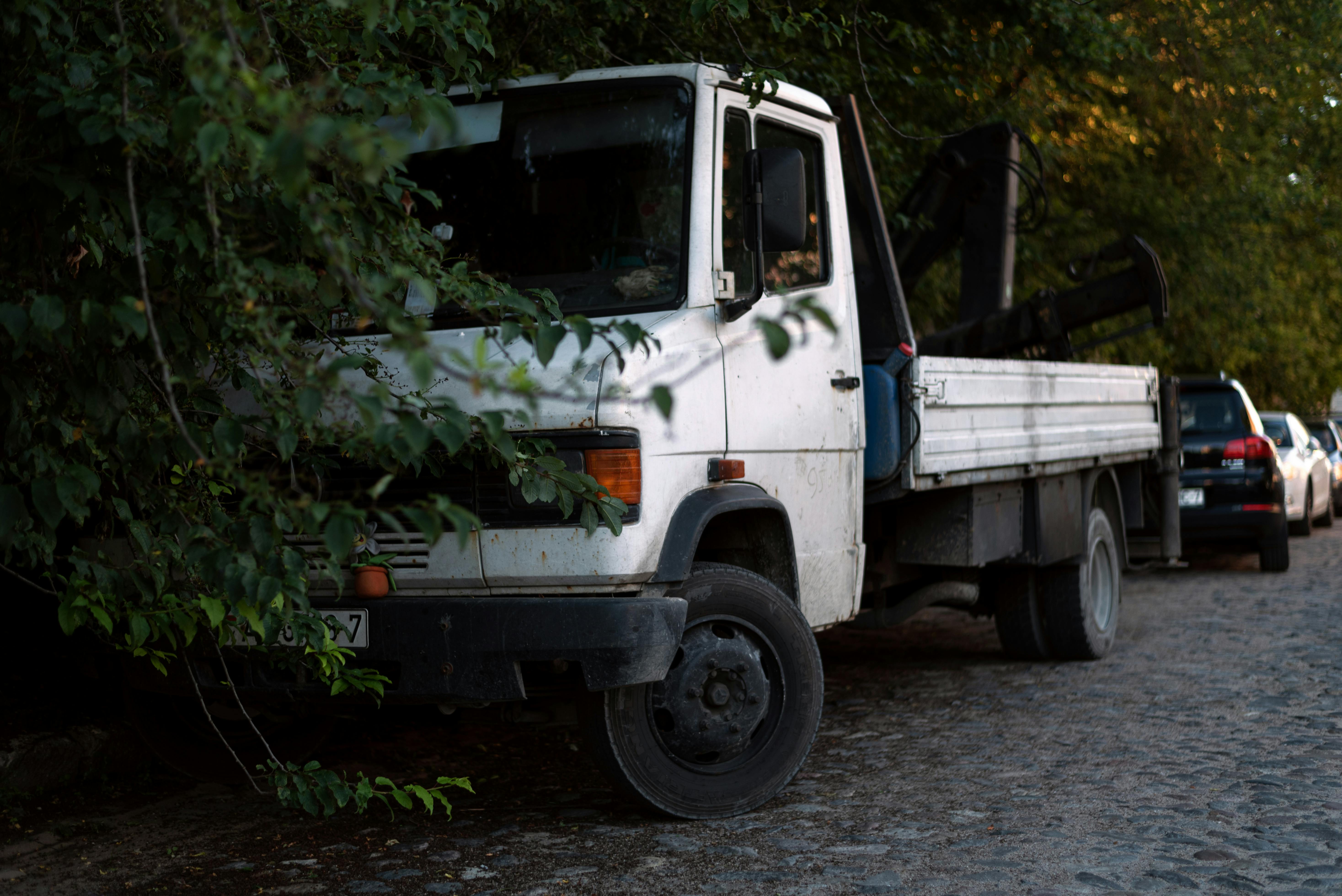 A Truck Parked On A Road · Free Stock Photo