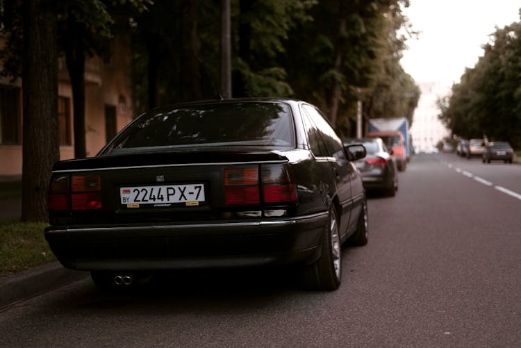 A Car Parked On A Street 