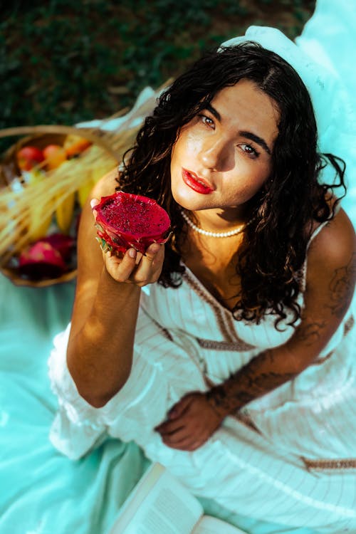 Bride Having Picnic with Fruits