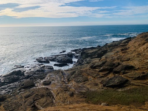 Foto profissional grátis de áspero, costa, horizonte