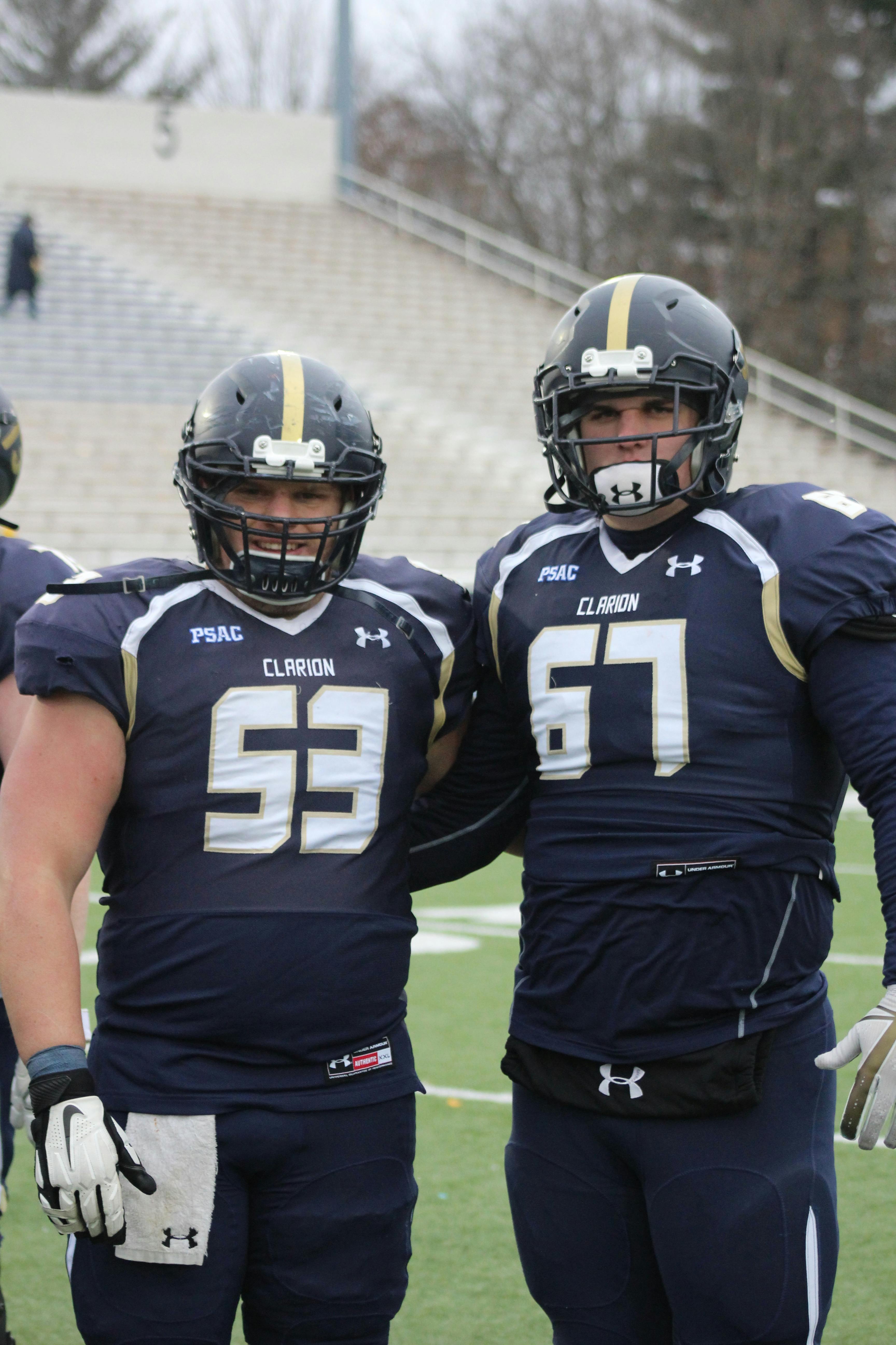 Tactical drawing of football plays on a chalkboard