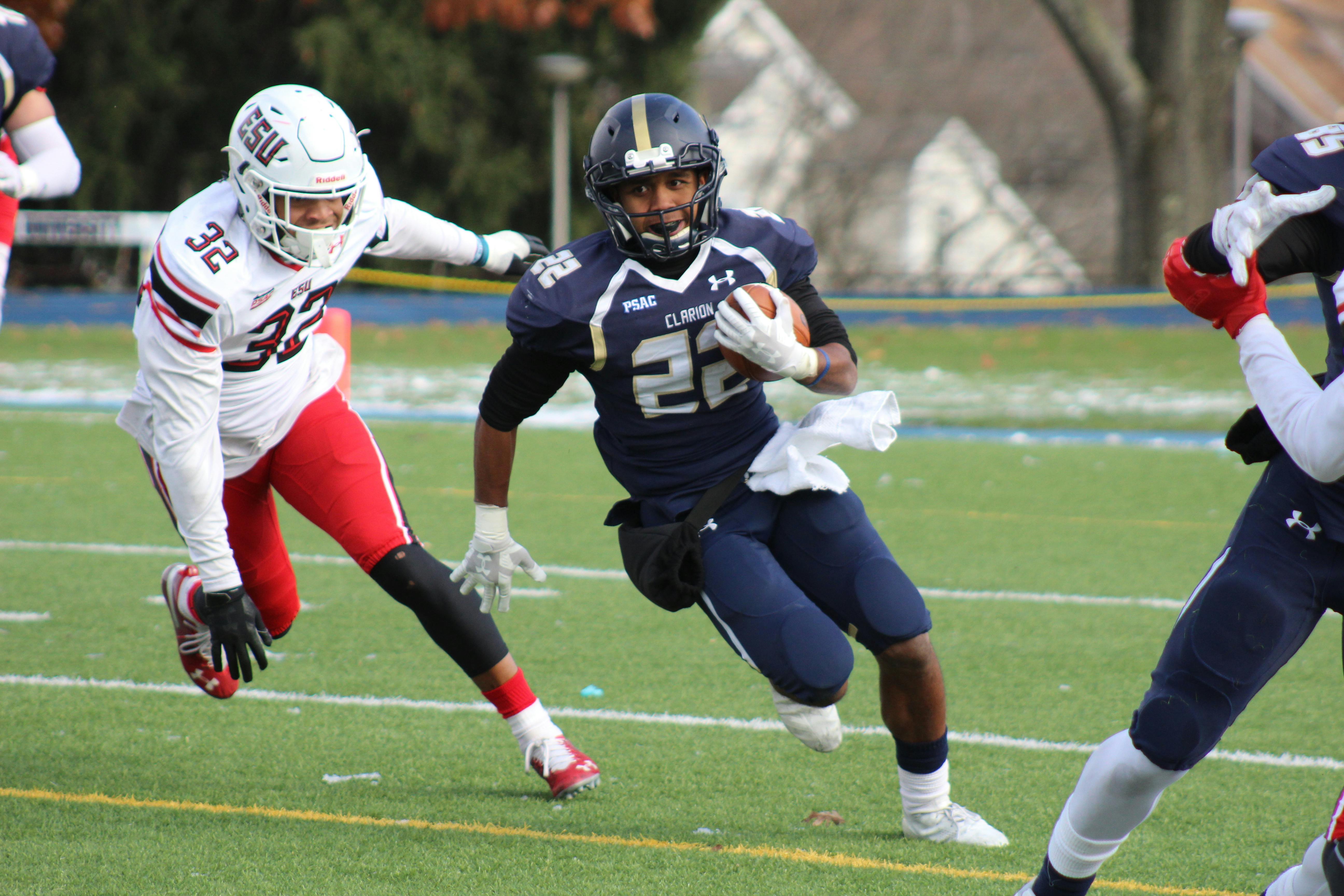 American football players celebrating a touchdown together