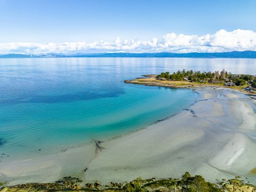 Free A breathtaking aerial view of the serene shoreline on Hornby Island, BC, Canada. Stock Photo