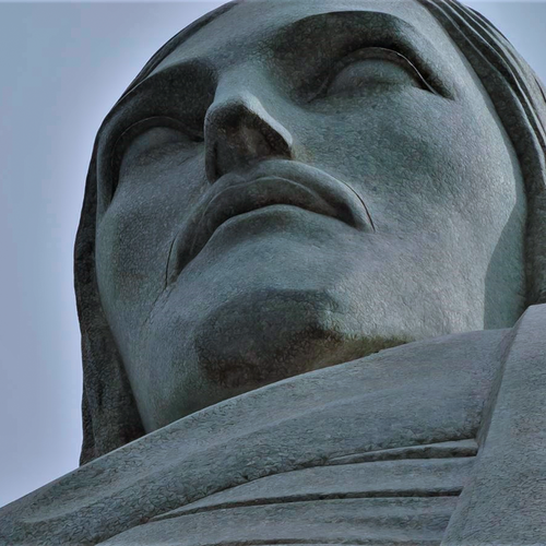 Free Striking low-angle view of Christ the Redeemer statue in Rio de Janeiro showcasing its grandeur and intricate stone details. Stock Photo