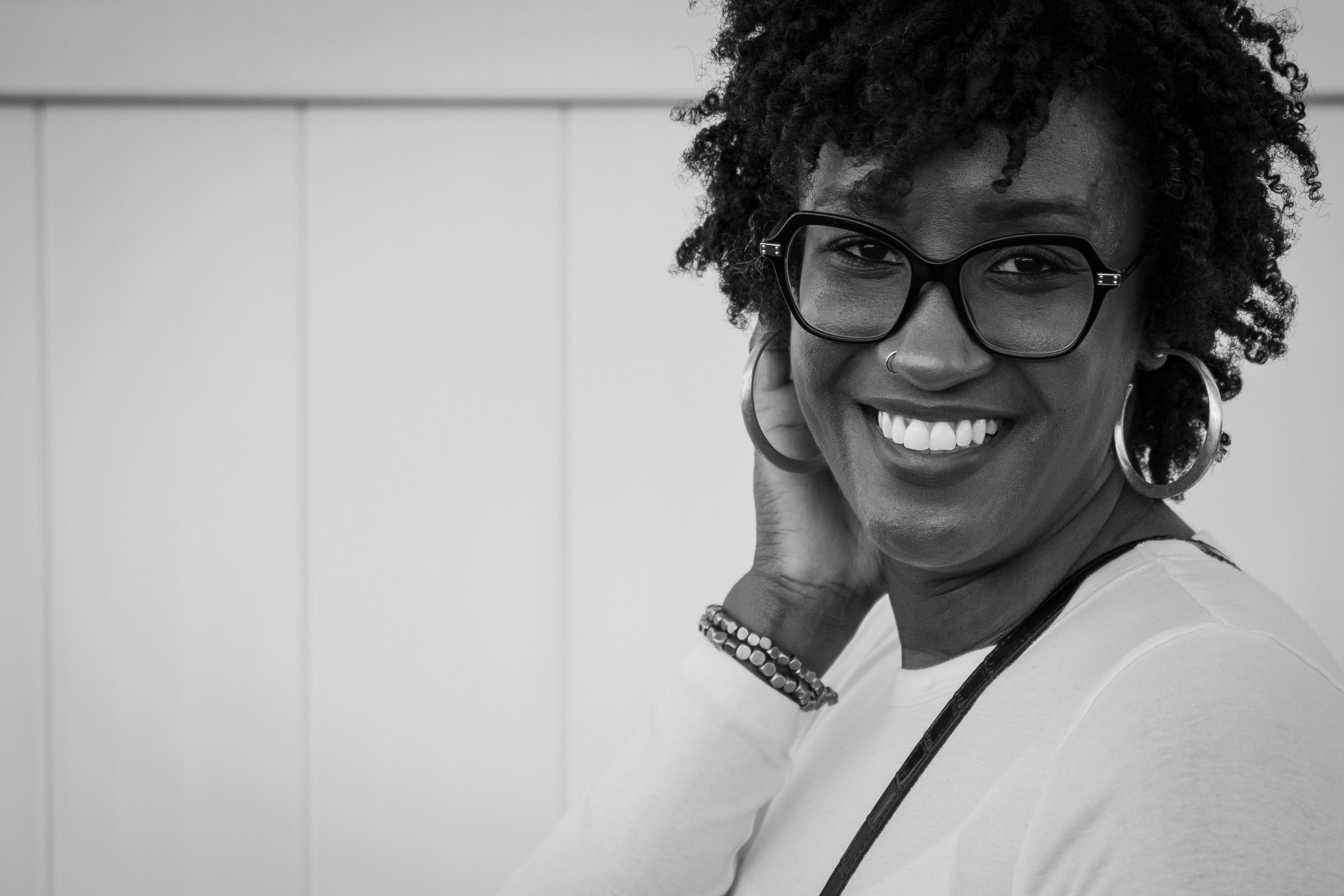 Portrait of a Young Woman Smiling at the Camera · Free Stock Photo