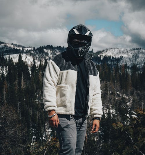 Clouds over Person in Motorcycle Helmet