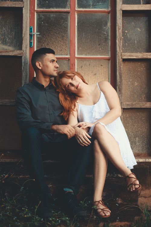 Free A couple sitting together, showcasing love and relaxation. Stock Photo
