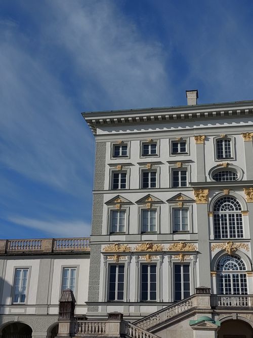 Free Elegant historical building with intricate details against a bright blue sky. Stock Photo