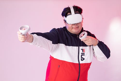 Man Playing Games in VR Goggles