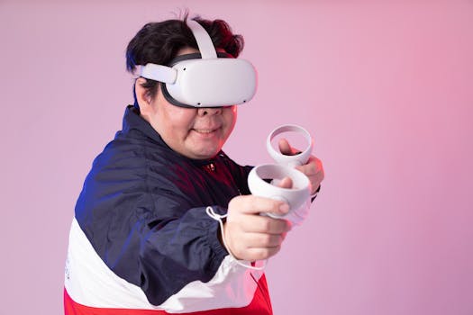 Asian man with VR goggles enjoying immersive gaming in a studio setting.
