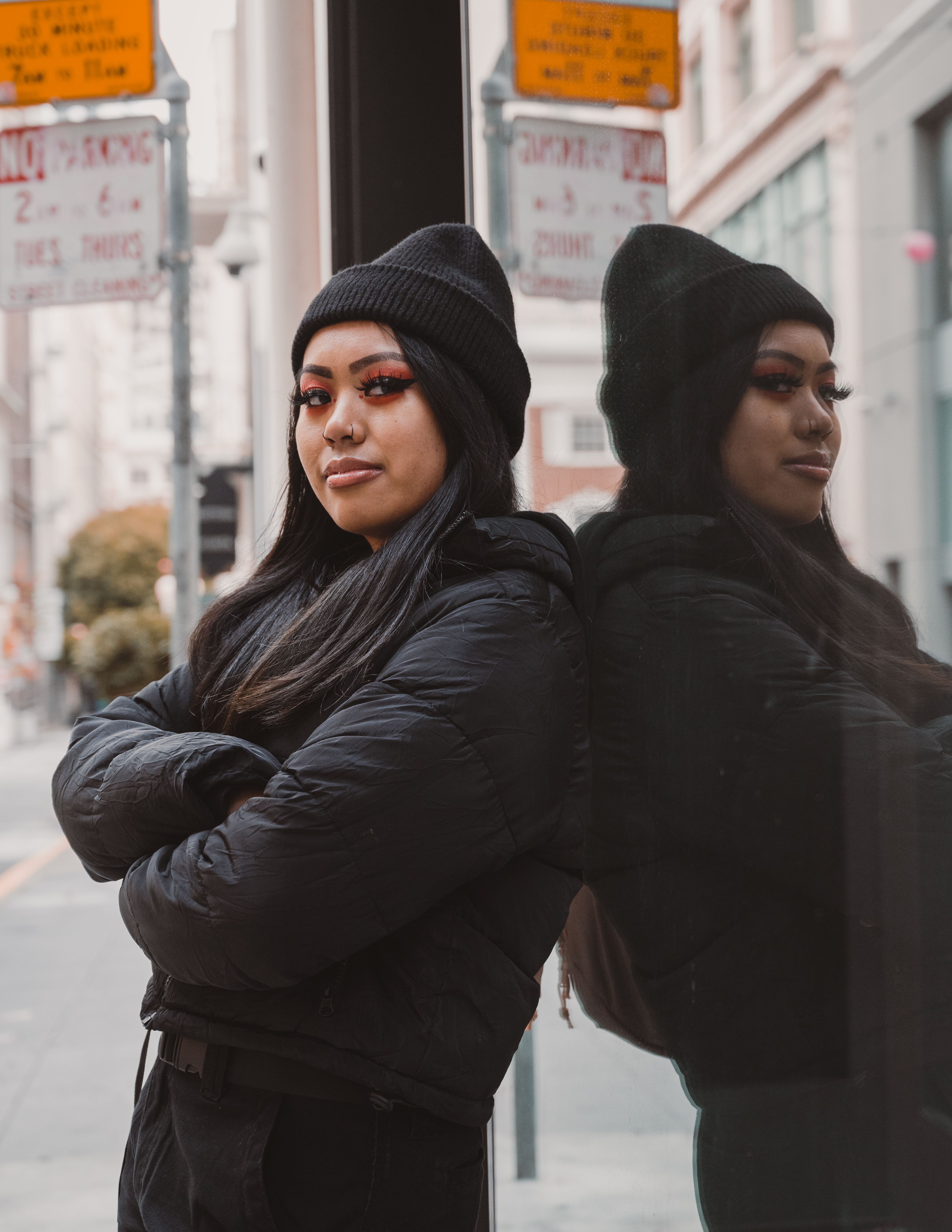 Woman Posing in Black Jacket and Hat · Free Stock Photo