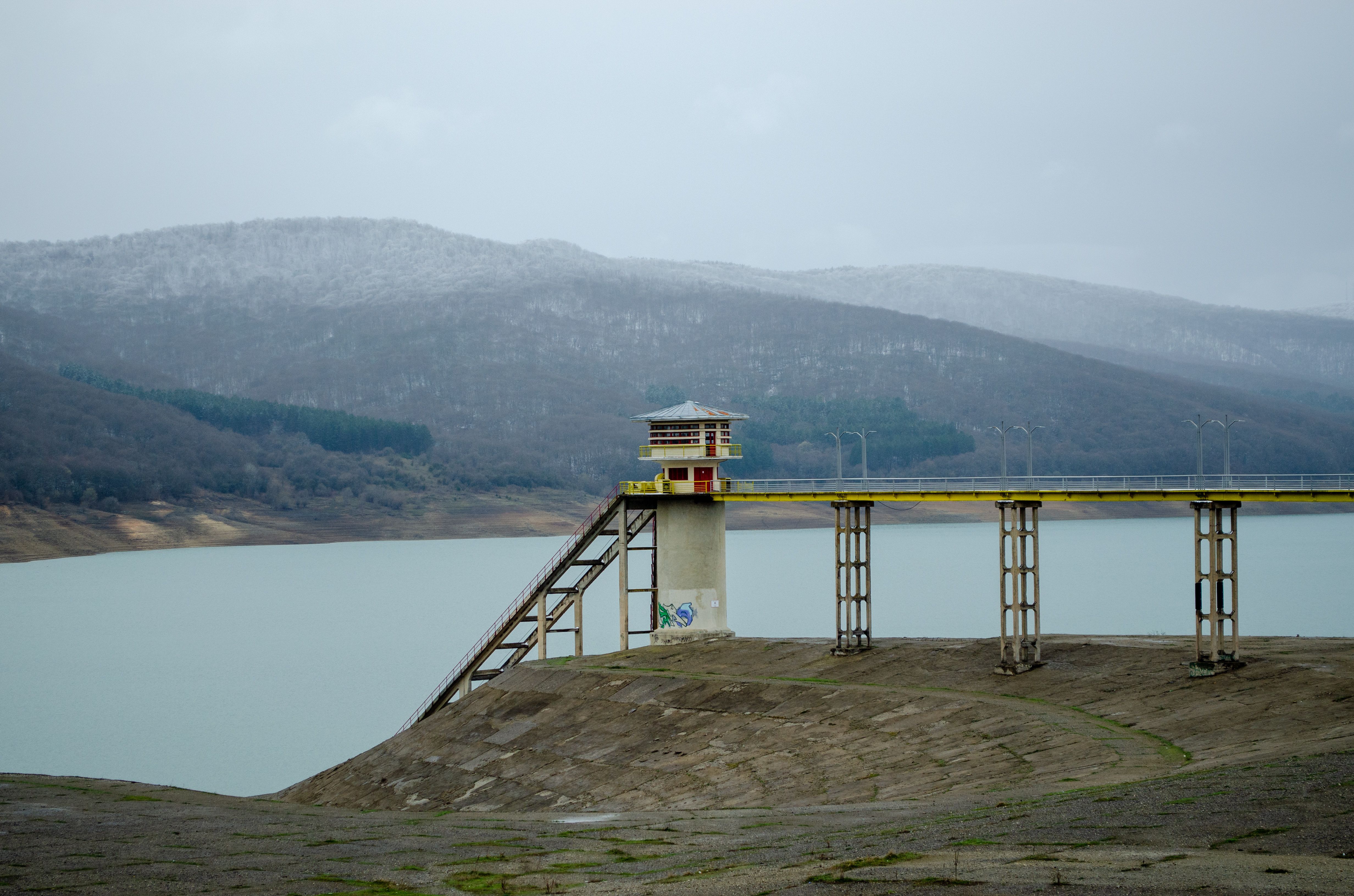 Ananuri Fortress overlooking the turquoise Jinvali Reservoir in Georgia