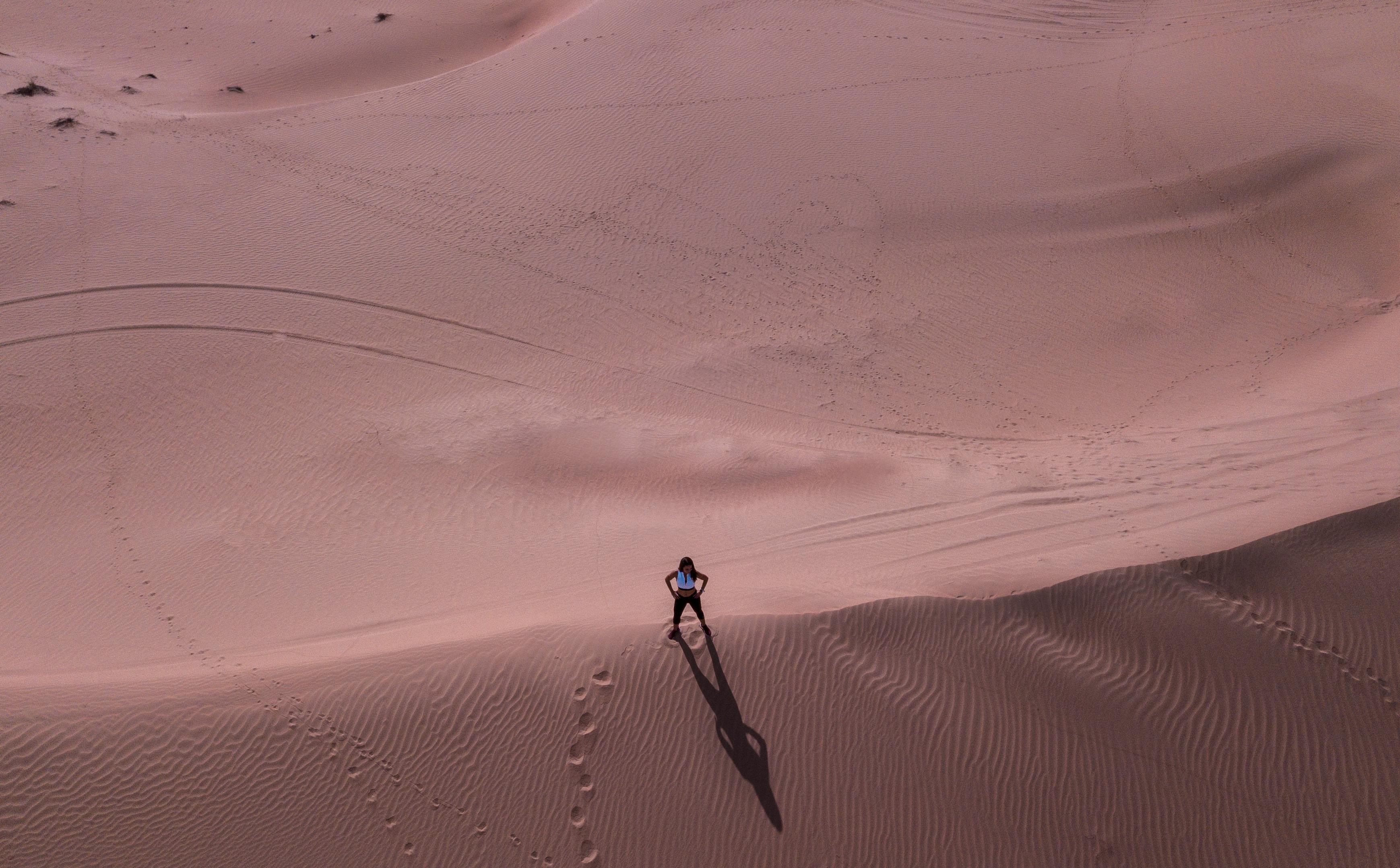 man stands on desert