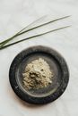 Powder on Round Black Surface