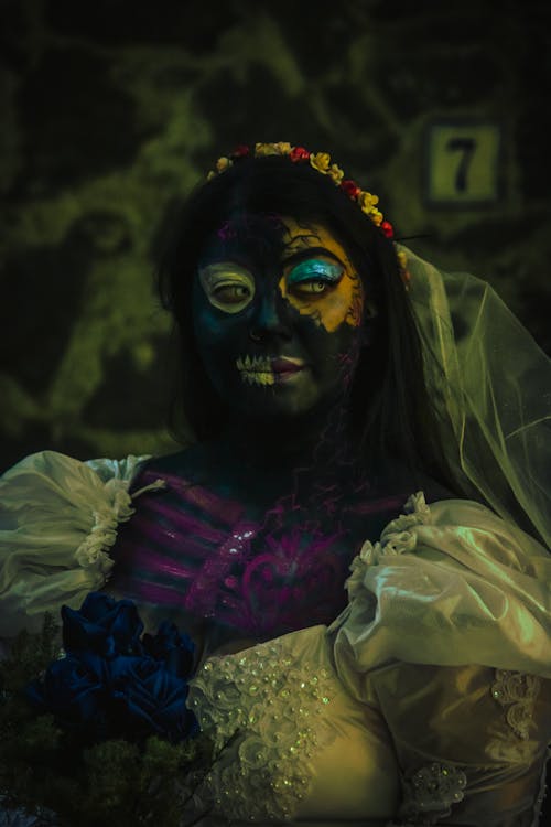 Woman Wearing Costume and Makeup for the Day of the Dead 