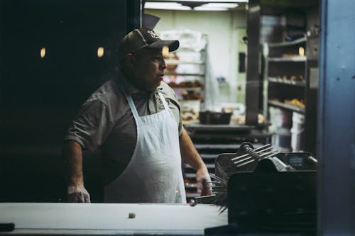 Man Wearing White Apron