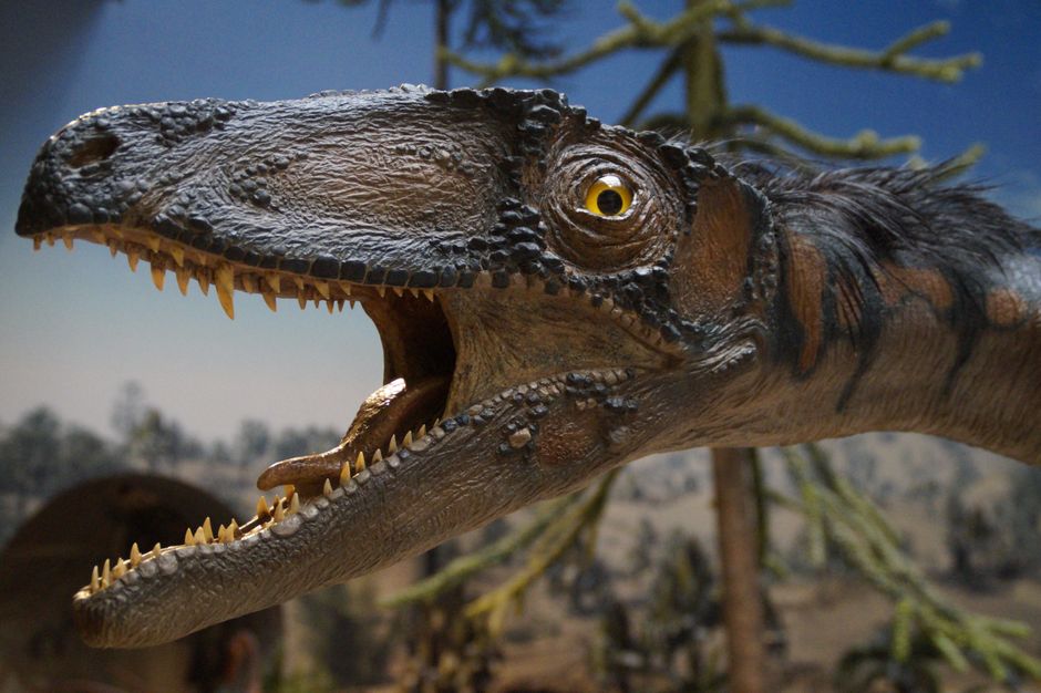 Brown Dinosaur Beside Green Tree Free Stock Photo brown-dinosaur-beside-green-tree-free-stock-photo