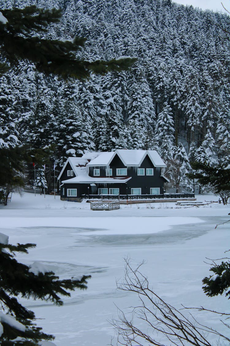 A House In A Snowy Mountain Valley 