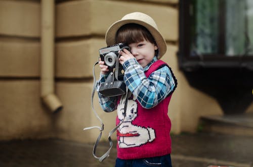 Free Toddler in Preppy Look Outfit Taking Photo Stock Photo