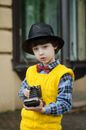 Boy Holding Camera