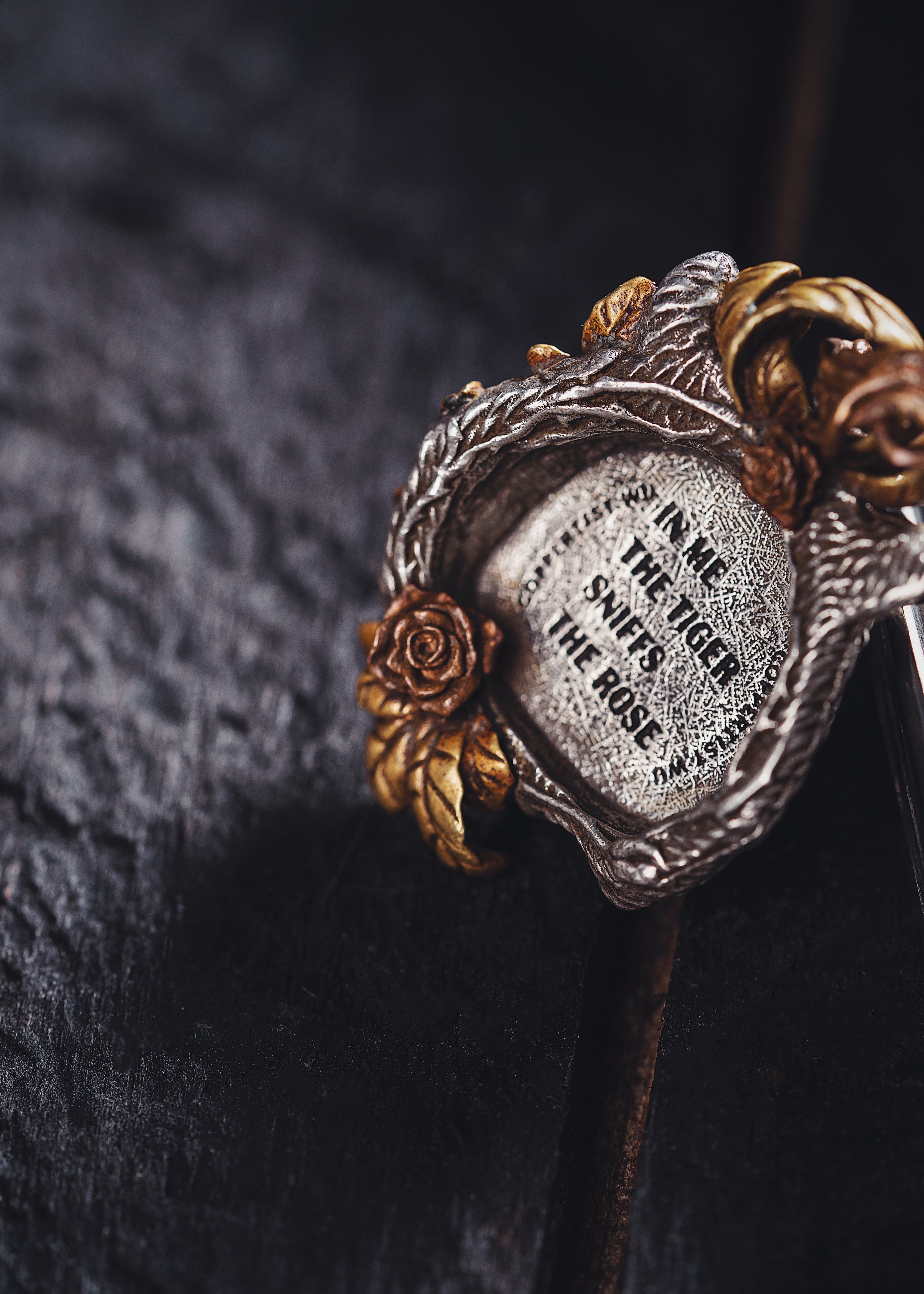 Close up of a Pendant with a Text · Free Stock Photo