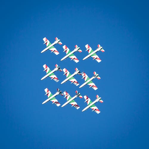 Green-and-white Show Planes on Sky
