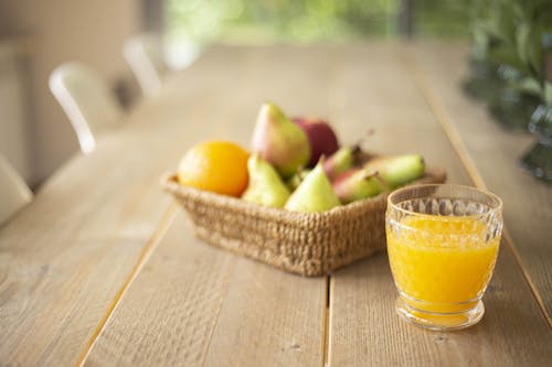 Fruit Juice and Fruit in Basket