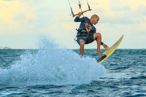Free Photo of Man Surfing Stock Photo