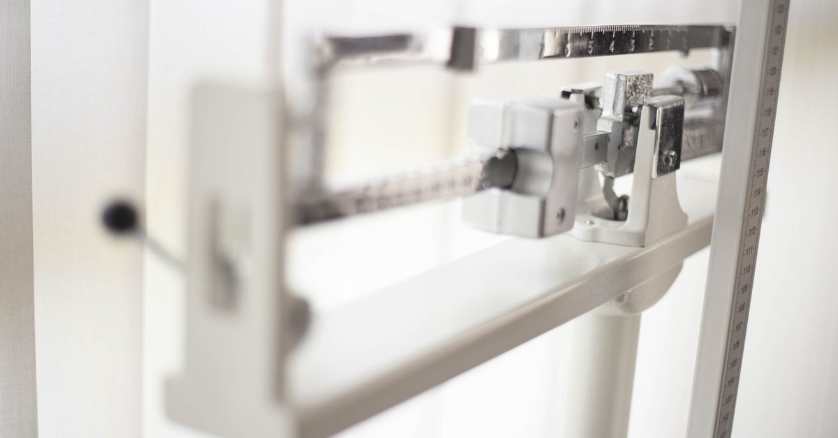 Detailed view of a classic mechanical balance scale, offering precision in weight measurement.
