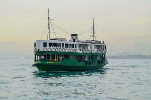 Free Boat Swimming in Sea  Stock Photo