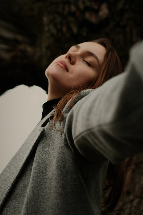 Woman Posing with Eyes Closed