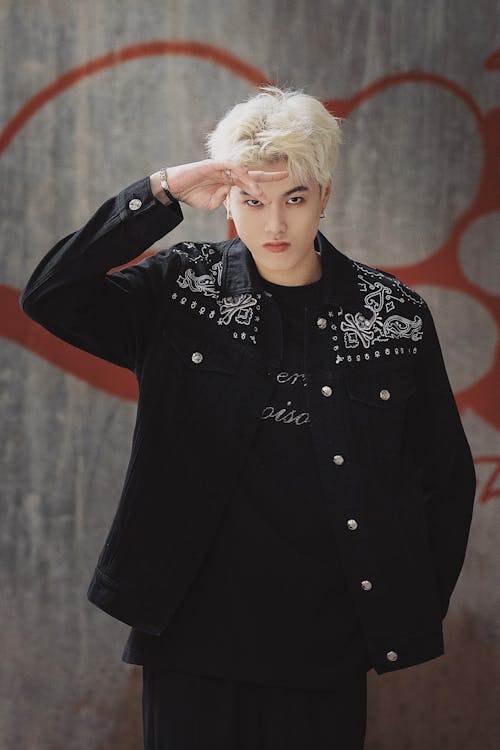 A Fashionable Young Man with Dyed Platinum Blond Hair 