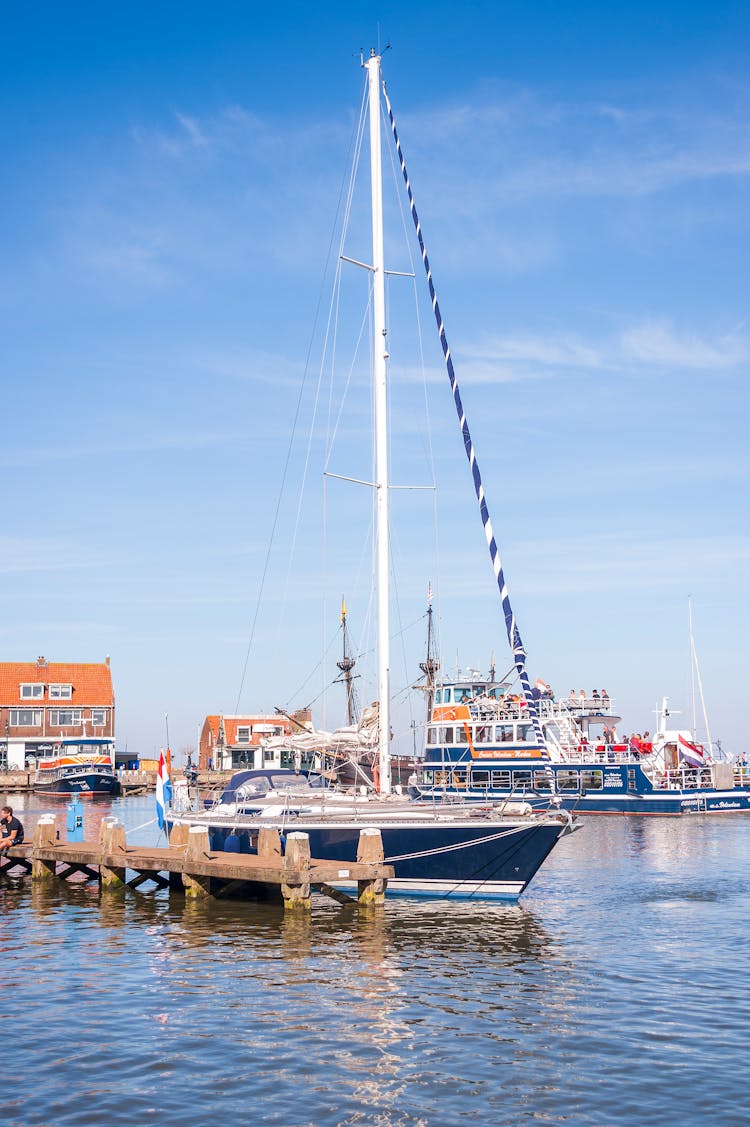 A Sailboat In The Port 