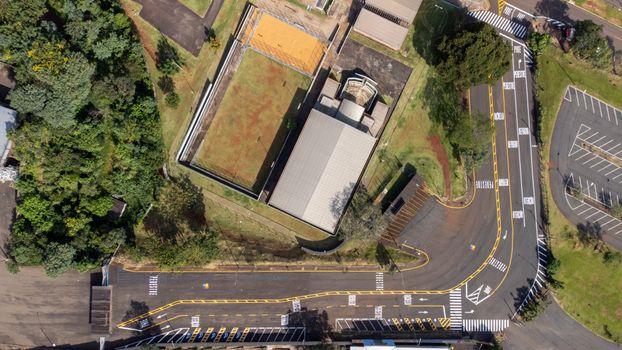 Drone shot capturing roads and greenery in Londrina, Brazil.