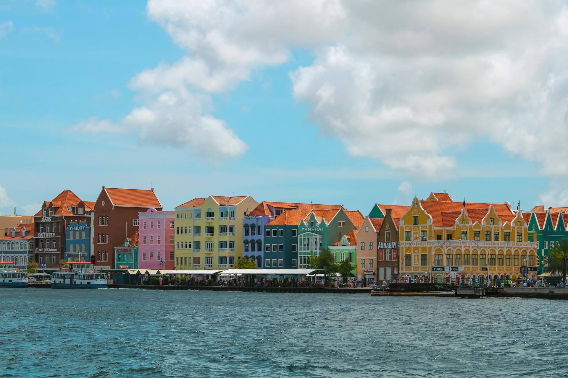 Vibrant Dutch colonial architecture along Willemstad's waterfront, Curacao.