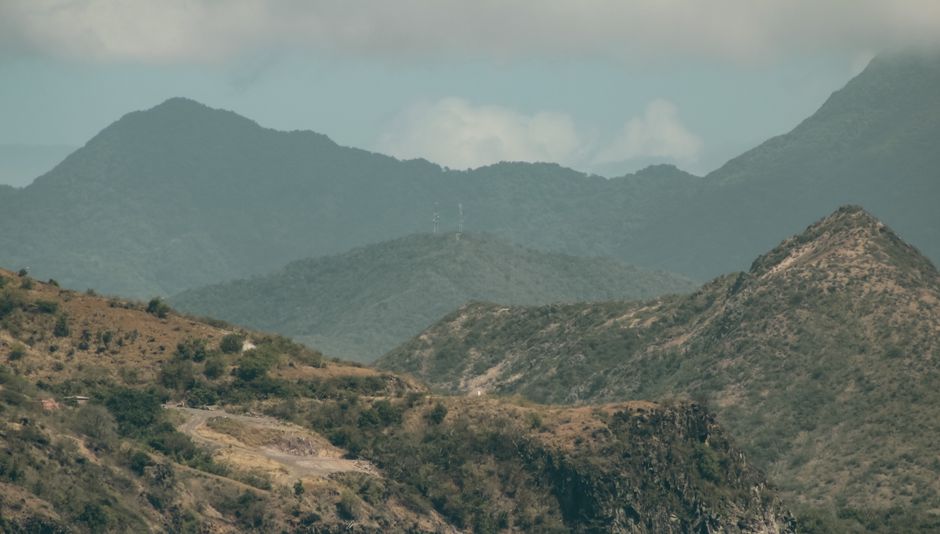Spectacular Cabo Pulmo National Park Snorkel Expedition from Cabo San Lucas Review 2026 - A serene view of layered mountains and hills under a cloudy sky, perfect for nature enthusiasts.