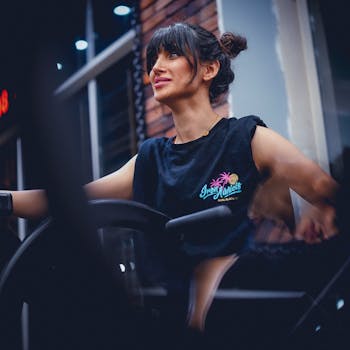 A woman working out on exercise equipment at a gym in Sulaymaniyah, Kurdistan Region, Iraq.