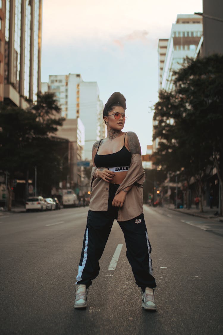 Portrait Of A Woman Standing On A Street 