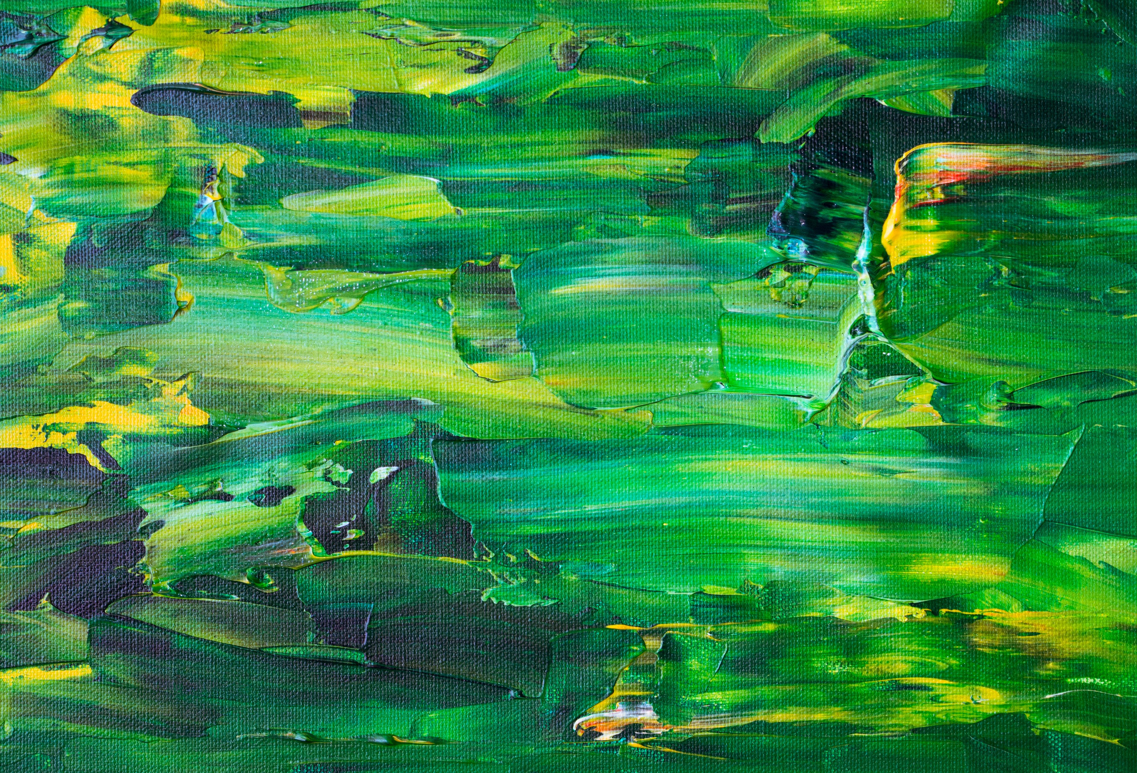Bold and colorful abstract painting featuring greens and yellows, showcasing dynamic brushstrokes.