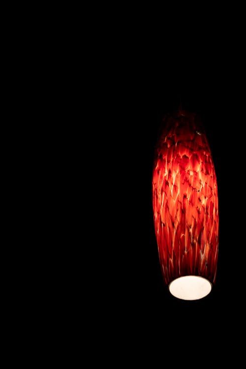 Red Lamp Shining in Darkness