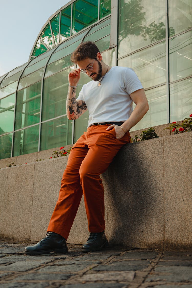 Man Leaning On Wall