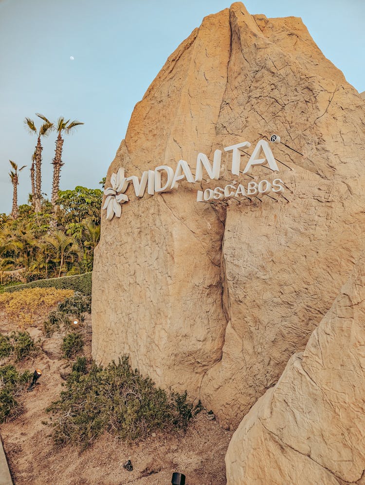 Hotel Logo On Dry Boulder In Mexico